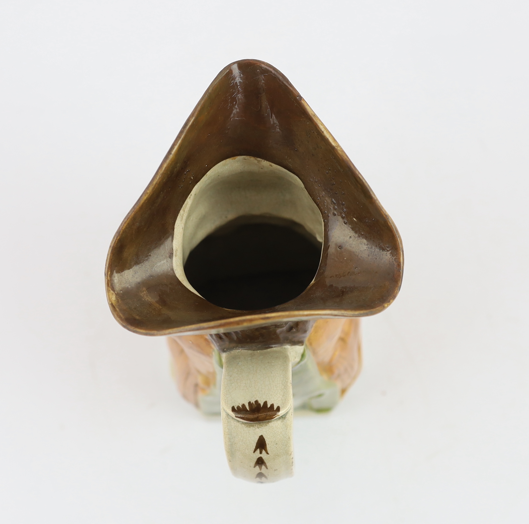 A Staffordshire Prattware Toby jug, c.1790-1800, restoration to front of hat